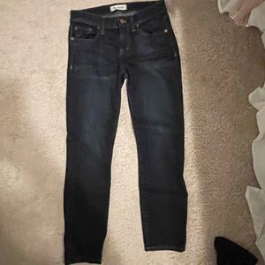 Low rise Madewell skinny jeans.